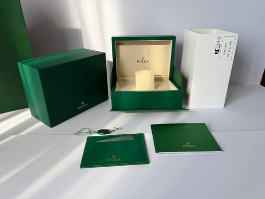 Premium green watch box set with accessories and elegant packaging
