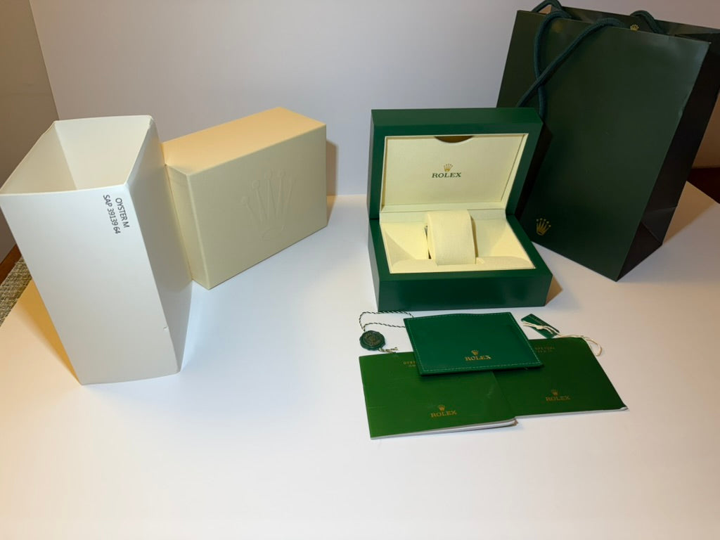 Complete watch storage gift set with box, packaging, and collector accessories