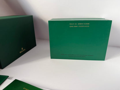 Luxury watch box exterior view showing smooth green surface and design